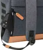 A close-up view of a backpack, showing a phone in a side pocket and a strap. Produktbild-Vorschau