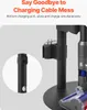 A close-up of a vacuum cleaner stand with a charging port and accessories. Voir les images du produit