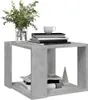 A modern concrete-effect side table with decorative items and books. Podgląd zdjęcia produktu