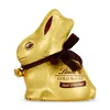 A Lindt Gold Bunny chocolate figure wrapped in gold foil, tied with a brown ribbon and a small bell. Anteprima dell’immagine prodotto