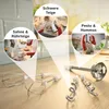 A kitchen scene showing a hand mixer and its various attachments, with inset images demonstrating its use for different food preparations. Produktbild-Vorschau
