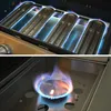 Close-up shots of a gas grill's burners, one showing multiple burners with blue flames, and the other showing a single burner with blue and orange flames. Produktbild-Vorschau