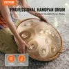 A person is holding a handpan drum with musical notes and text overlays. Voir les images du produit
