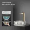 A bathroom sink and faucet are displayed with feature callouts. Náhled obrázku produktu