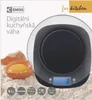 A digital kitchen scale with an egg in a shell on a bed of flour, surrounded by packaging elements. Náhľad obrázku produktu
