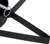 A close-up view of a black metal tree stand with a spring mechanism. Náhled obrázku produktu