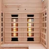 Interior view of a wooden infrared sauna with heating elements visible. Produktbild-Vorschau