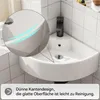 A close-up view of a white corner sink with a black faucet, set against a tiled wall. A magnified circle highlights the thin edge design and smooth surface of the sink. Anteprima dell’immagine prodotto