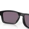 A close-up view of a pair of black sunglasses with purple lenses. Náhled obrázku produktu