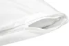 A close-up view of a white pillow or duvet cover with a zipper. Produktbild-Vorschau