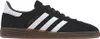 A studio shot of a black Adidas sneaker with white stripes and a gum sole. Podgląd zdjęcia produktu
