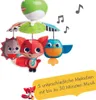 A mobile toy with animal figures hanging from a green dome, with musical notes depicted in the air. Voir les images du produit