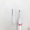 Two parts of a white electric trimmer with silver blades and a pink ring are shown against a white background. Náhled obrázku produktu