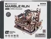 The image shows the packaging of a ROKR 3D-Holz-Puzzle Murmelbahn / Kugelbahn 'Marble Spaceport'. The box displays a detailed image of the assembled marble run. Podgląd zdjęcia produktu