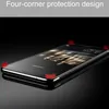 A smartphone case is shown from a diagonal angle on a black reflective surface, with red corner highlights indicating protection. Produktbild-Vorschau