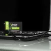 A Vayox rechargeable battery is shown connected to a cable, resting on a laptop. Anteprima dell’immagine prodotto