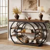 A console table with shelves is displayed in a room setting, showcasing decorative items. Náhľad obrázku produktu