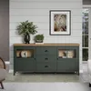 A dark green sideboard with a wooden top is displayed in a room with shiplap walls and a rug on the floor. Podgląd zdjęcia produktu