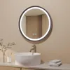 A modern bathroom vanity with a round LED mirror above a white sink. Produktbild-Vorschau