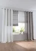 A window with curtains and Roman blinds, overlooking a garden. Produktbild-Vorschau