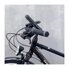 Close-up of a bicycle's handlebars with a phone mount attached. Voir les images du produit