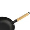 A close-up shot of a frying pan with a wooden handle. Podgląd zdjęcia produktu