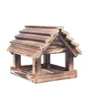 A wooden bird feeder on a white background. Podgląd zdjęcia produktu