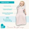 A baby wearing a swaddle bag, with text describing its features and a customer review. Voir les images du produit