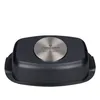 The bottom view of a black baking pan with a silver metal insert in the center. Podgląd zdjęcia produktu