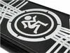 A close-up view of a black scooter deck with a white graphic logo and pattern. Produktbild-Vorschau