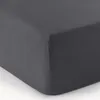 A close-up, studio shot of a dark gray fitted sheet, showing the texture and corner. Produktbild-Vorschau