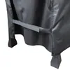 Close-up of the bottom of a black grill cover with a velcro strap. Produktbild-Vorschau