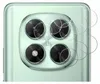 A close-up view of the camera lenses on the back of a light green smartphone. Produktbild-Vorschau