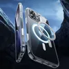 Two clear phone cases with magnetic rings are displayed against a dark, rocky background with a blue sky. Náhľad obrázku produktu