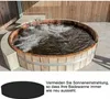 A wooden hot tub with bubbling water, and a separate black cover shown below with German text. Produktbild-Vorschau