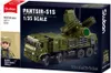 The image shows the packaging of a Sluban building block set, featuring a model of the Pantsir-S1S air defense system and a minifigure. Produktbild-Vorschau