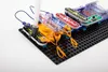 A close-up shot of electronic building blocks arranged on a black baseplate. Podgląd zdjęcia produktu