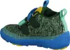 A side view of a child's shoe. Voir les images du produit