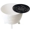 A white planter with a black insert, shown on a white background. Produktbild-Vorschau