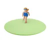 A small figurine of a woman on a green disc. Produktbild-Vorschau
