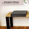 A dark gray corduroy cushion is placed on a wooden bench with black legs. Anteprima dell’immagine prodotto