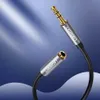 A close-up shot of a Ugreen audio cable with gold-plated connectors against a blue gradient background. Produktbild-Vorschau