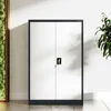 A metal cabinet with two doors and a lock is shown in a well-lit room with a plant and a moss wall. Produktbild-Vorschau