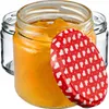 Three glass jars, one filled with orange jam, with a red lid decorated with white hearts. Voir les images du produit