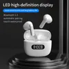 A pair of white wireless earbuds and their charging case are displayed on a dark, multi-tiered platform against a dark background. Produktbild-Vorschau