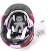 The inside of a child's helmet with a tag attached. Náhľad obrázku produktu