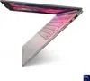 A silver laptop is shown at an angle with its screen open, displaying a colorful abstract image. The keyboard area is illuminated with a pink glow. Anteprima dell’immagine prodotto
