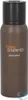 A brown spray can of deodorant with a black cap. Anteprima dell’immagine prodotto