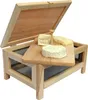 A wooden cheese cellar with a serving tray and cheese inside, with the lid open. Voir les images du produit