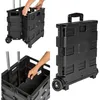 Collage of images showing a black foldable shopping trolley in different states of use and assembly. Anteprima dell’immagine prodotto